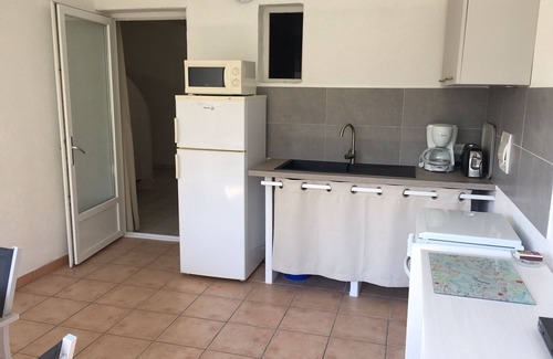 Favone Apartamento | Faounzina, 4 pers, 1 ° piso, frente al mar con acceso directo a la playa