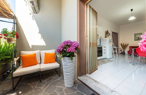 Villa San Pietro Apartamento | Apartamento 'Gerani Rossi' con jardín compartido, Wi-Fi y aire acondicionado