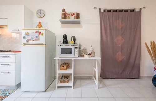 Villa San Pietro Apartamento | Apartamento 'Gerani Rossi' con jardín compartido, Wi-Fi y aire acondicionado