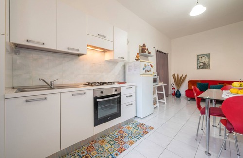 Villa San Pietro Apartamento | Apartamento 'Gerani Rossi' con jardín compartido, Wi-Fi y aire acondicionado