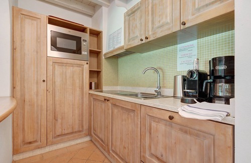 Puegnago del Garda Apartamento | Apartamento 'Giada' con piscina compartida, Wi-Fi y aire acondicionado