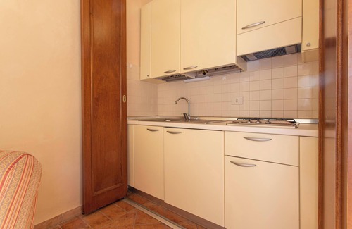 Riotorto Apartamento | Apartamento Giglio con vistas al mar, piscina, Wi-Fi, aire acondicionado y jardín