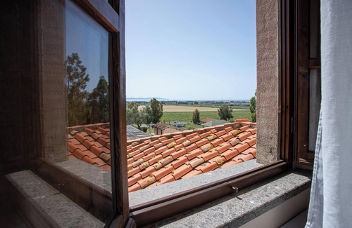 Riotorto Apartamento | Apartamento Giglio con vistas al mar, piscina, Wi-Fi, aire acondicionado y jardín