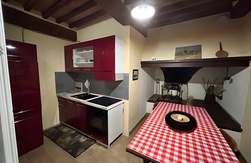 Vescovado Apartamento | Apartamento 'Glicine - Antiche Dimore' con Piscina Compartida, Wi-Fi y Aire Acondicionado