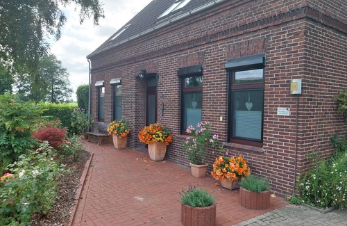 Oberhammelwarden Apartamento | Apartamento - Haus Am Diek - directamente en la ruta ciclista de Weser