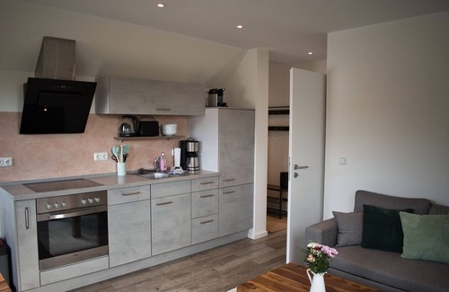 Kalkhorst Apartamento | Apartamento 'Haus Kirchenblick' con terraza privada, jardín comunitario y wifi