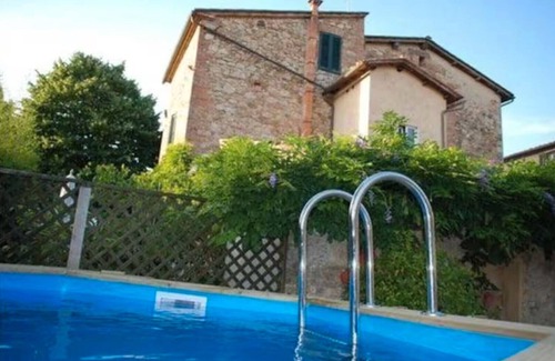 Vescovado Apartamento | Apartamento 'Il Caminetto - Antiche Dimore' con Piscina Comunitaria, Wi-Fi y Aire Acondicionado