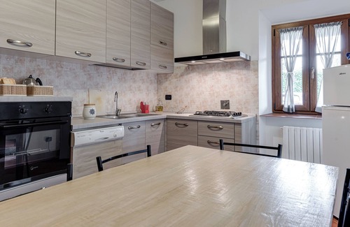 Pelago Apartamento | Apartamento 'Il Cerro La Capanna Piano Terra' con piscina y jardín compartidos