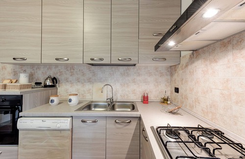 Pelago Apartamento | Apartamento 'Il Cerro La Capanna Piano Terra' con piscina y jardín compartidos