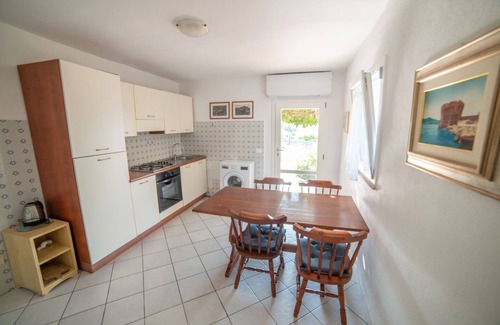 Patresi Casa | Apartamento "Il Mirto" con jardín mediterráneo y vistas al mar