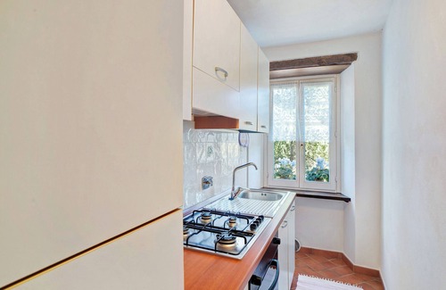 Siglioli Apartamento | Apartamento 'Il piccolo fienile' con piscina compartida, jardín y Wi-Fi