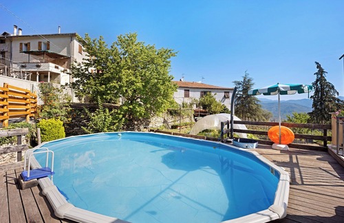 Siglioli Apartamento | Apartamento 'Il piccolo fienile' con piscina compartida, jardín y Wi-Fi