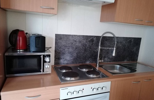 Buochs Apartamento | Apartamento en una casa de familia, con impresionantes vistas del lago y las montañas