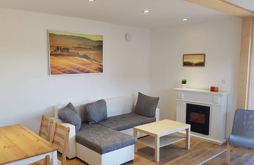 Wustrow Apartamento | Apartamento en una casa de vacaciones romántica rústica en el lago Plätlinsee con acceso al lago