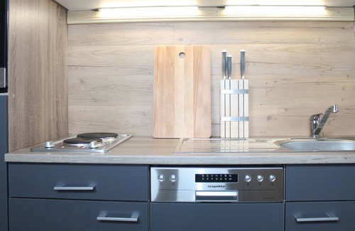 Wustrow Apartamento | Apartamento en una casa de vacaciones romántica rústica en el lago Plätlinsee con acceso al lago