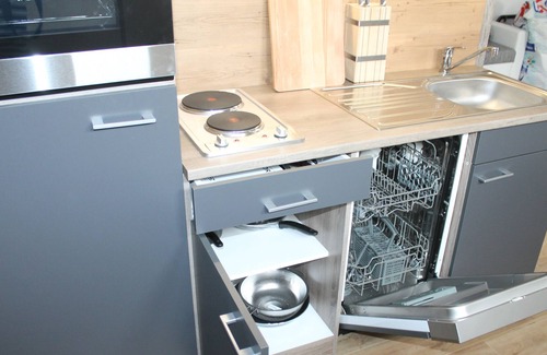 Wustrow Apartamento | Apartamento en una casa de vacaciones romántica rústica en el lago Plätlinsee con acceso al lago