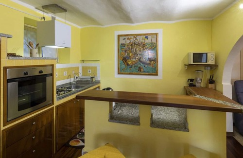 Carciano Chalet De Esquí | Apartamento en chalet de piedra rodeado de vegetación a pocos pasos del lago.