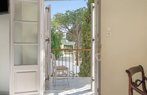 Massouri Apartamento | Apartamento 'Ismini Side Sea View' con jardín compartido, Wi-Fi y aire acondicionado.
