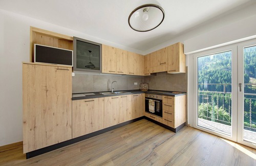 San Pietro di Cadore Apartamento | Apartamento 'Blu' con vistas a la montaña, terraza privada y Wi-Fi