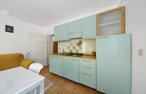 San Pietro di Cadore Apartamento | Apartamento 'Arancio' con vistas a la montaña, terraza privada y Wi-Fi
