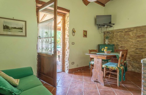Magliano in Toscana Otro | Apartamento La Quercia con vistas a la montaña, terraza, piscina compartida y Wi-Fi