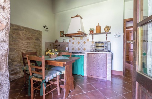 Magliano in Toscana Otro | Apartamento La Quercia con vistas a la montaña, terraza, piscina compartida y Wi-Fi