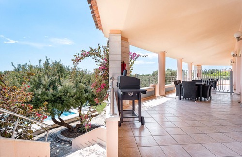 Sas Linnas Siccas Apartamento | Apartamento 'La Vela Gialla' con vistas al mar, Wi-Fi y aire acondicionado