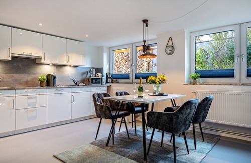 Brodten Apartamento | Apartamento 'Meerlust' con terraza privada, jardín privado y Wi-Fi