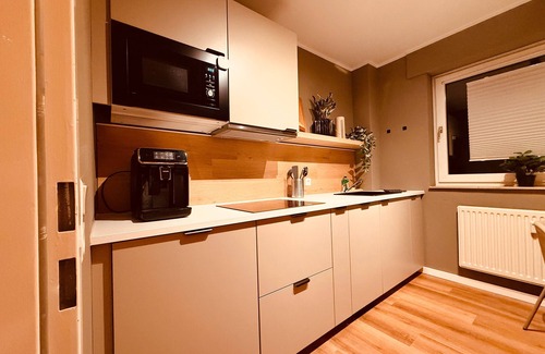 Huenxe Apartamento | Apartamento 'Modernes Design-Apartment Huenxe' con balcón y Wi-Fi