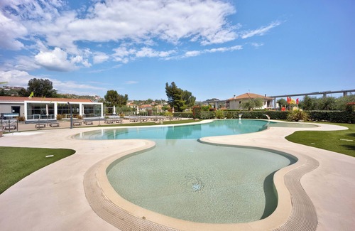 Poggi Apartamento | "Appartamento Monolocale Rebi" con piscina compartida, jardín y Wi-Fi