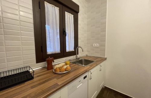 Hervas Apartamento | Apartamento número 5 bajo con terraza y jardín