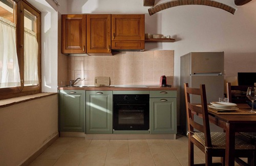 Gavorrano Apartamento | Apartamento 'Podere Le Sugherine - Camino' con piscina compartida, Wi-Fi y aire acondicionado