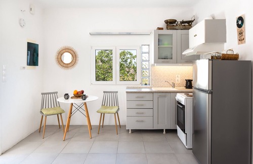 Vourvoulos Apartamento | Apartamento 'Psarrou Residence' con vistas al mar, Wi-Fi y aire acondicionado