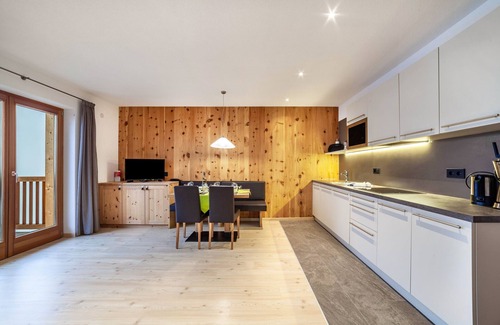 Ultimo Apartamento | Apartamento "Residence Kalchgruberhof - Lärche" con vistas a la montaña, jardín compartido y Wi-Fi