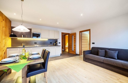 Ultimo Apartamento | Apartamento "Residence Kalchgruberhof - Lärche" con vistas a la montaña, jardín compartido y Wi-Fi