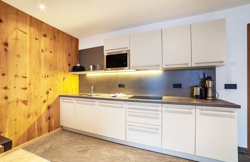 Ultimo Apartamento | Apartamento "Residence Kalchgruberhof - Lärche" con vistas a la montaña, jardín compartido y Wi-Fi