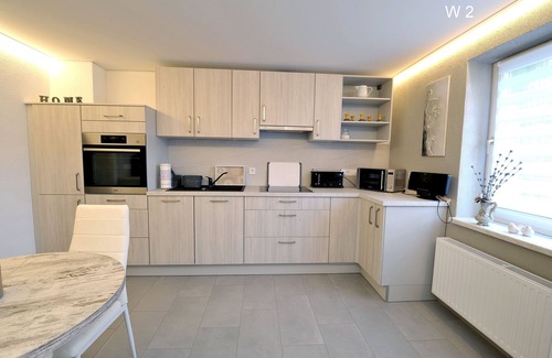 Babow Apartamento | Apartment Rita 2, bedroom, living room, kitchen, shower/WC, outdoor seating area - Ferienwohnungen Rita