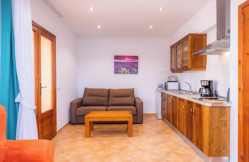 Ariany Apartamento | Apartamento 'S Hort Can Capità Familiar Terraza 4' cerca del mar con piscina compartida y Wi-Fi