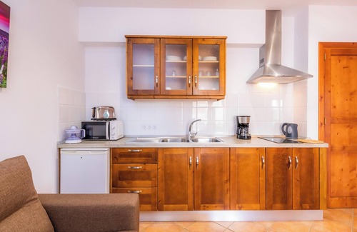 Ariany Apartamento | Apartamento 'S Hort Can Capità Familiar Terraza 4' cerca del mar con piscina compartida y Wi-Fi