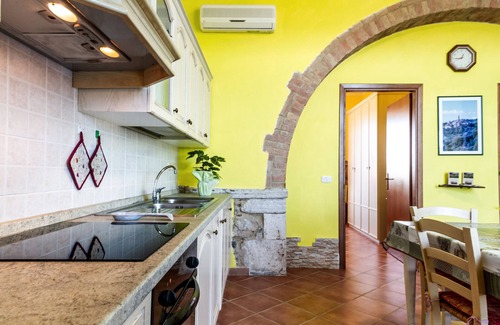 Magliano in Toscana Apartamento | Apartamento 'Stalla' con jardín compartido, Wi-Fi y aire acondicionado