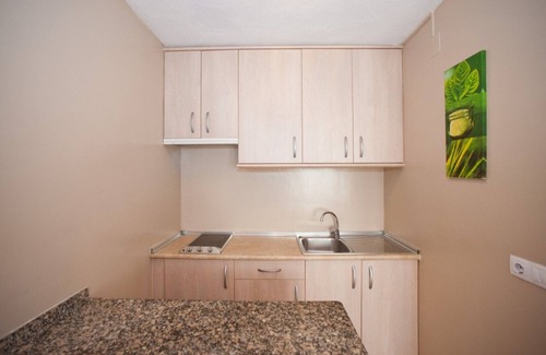 Santa Eulalia del Río Apartamento | Apartamento Ses Veles 1 dormitorio cerca de la playa con vista al mar, piscina, Wi-Fi y jardín