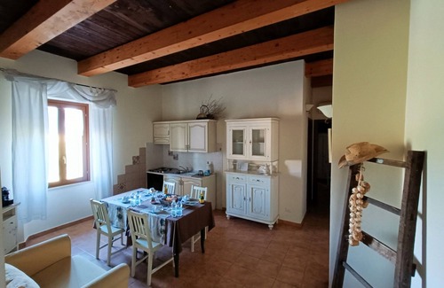 Fornole Apartamento | Apartamento 'Tenuta Marchesi Fezia - 1' con piscina compartida, Wi-Fi y aire acondicionado