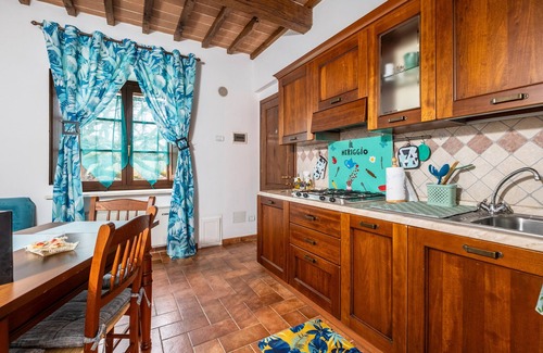 Catabbio Apartamento | Apartamento 'Tiffany' con piscina y jardín compartidos
