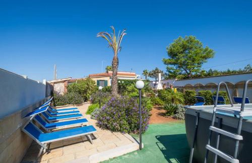 Scala di Furno Casa | Apartment Tritone in Luxury Villa with Shared Pool