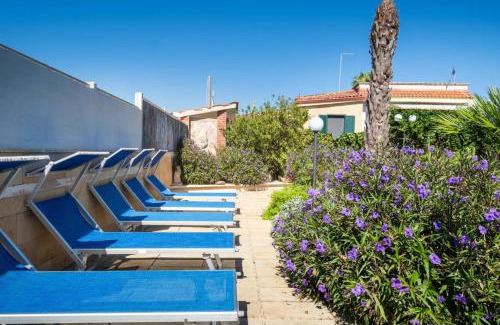 Scala di Furno Casa | Apartment Tritone in Luxury Villa with Shared Pool