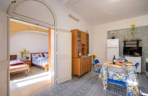 Scala di Furno Casa | Apartment Tritone in Luxury Villa With Shared Pool