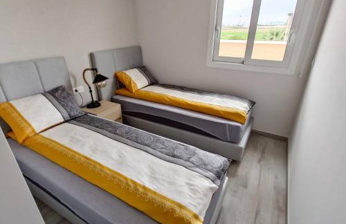 Pilar de la Horadada Apartamento | Apartment with private, heated jacuzzi, AC, pool