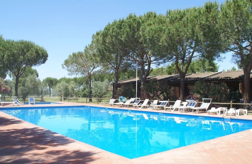 Piombino Apartamento | Acogedor apartamento con un bonito balcón o terraza en la costa