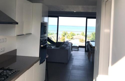 Roches Noires Apartamento | Apartment with a Sea View