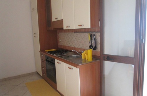 Tre Fontane Apartamento | Apartment with covered terrace and barbecue near sea and center
